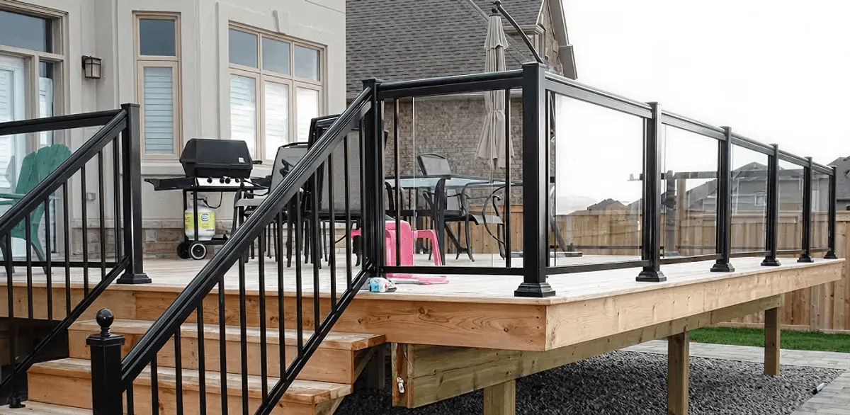 Handrail installation on a deck staircase for safety and code compliance in Denver, CO